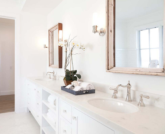 White Bathroom Cabinet. How to design a white bathroom without making it feel cold. #WhiteBathroom Graystone Custom Builders.