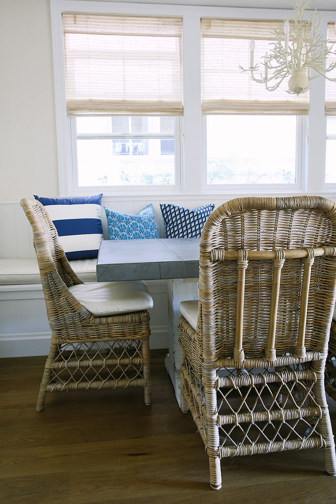 Wicker Chairs. Breakfast Nook with wicker chairs, zinc top table and Currey and Co. chandelier. #wickerChair #breakfastnook #zinctable Rita Chan Interiors.