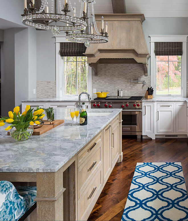 Wirebrushed White Oak Kitchen Island with Gray Stain. Kitchen and Hood are Wirebrushed White Oak with Gray Stain. Kitchen Cabinet. Wirebrushed White Oak with Gray Stain Martha O'Hara Interiors.