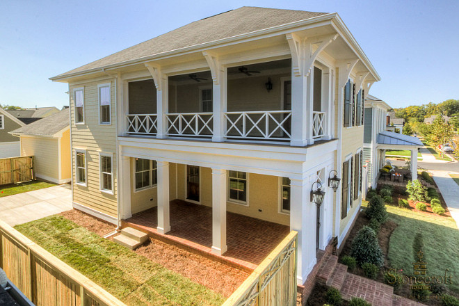 Yellow Home Exterior. Yellow Home Exteriors. Yellow Home Exterior Paint Color - Stonecroft Homes.