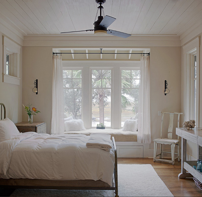 Master Bedroom window seat. Master bedroom with window seat. Neutral master bedroom window seat with linen cushion, white pillows and sheer curtains. #MasterBedroom #Windowseat #neutralInteriors Wayne Windham Architect, P.A. Interiors by Gregory Vaughan, Kelley Designs, Inc. Photos by Atlantic Archives, Inc. 