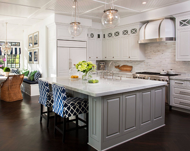 White kitchen cabinet with gray island paint color. The island is Sherwin Williams Mindful Gray 7016 and the cabinets are Sherwin William Pure White 7005. #SherwinWilliamsMindfulGray #SherwinWilliamsSW7016 #SherwinWilliamPureWhite ##SherwinWilliamSW7005 AGK Design Studio.