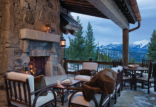 Rustic home with branch chairs. The branch chairs are from Old Hickory's outdoor collection. Sturdy enough for the elements and weatherproof caning on the dining chairs. The fabric is Sunbrella, outdoor chenille. Centre Sky Architecture Ltd