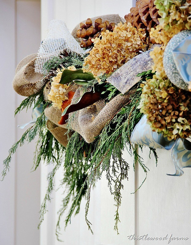 Christmas Mantel Decor. Swag greens with burlap and dried hydrangea. #Christmas #Mantel #Fireplace #Decor Castle Homes Via Thistlewood Farms.