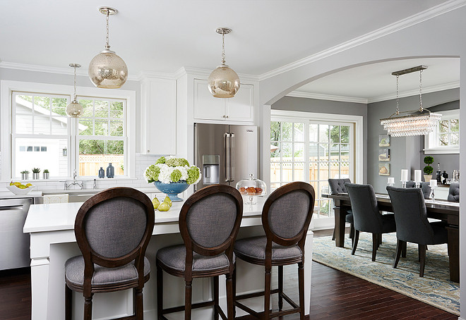 Kitchen opens to dining room. Kitchen with arch opening to dining room. #kitchen #dingroom Anchor Builders.