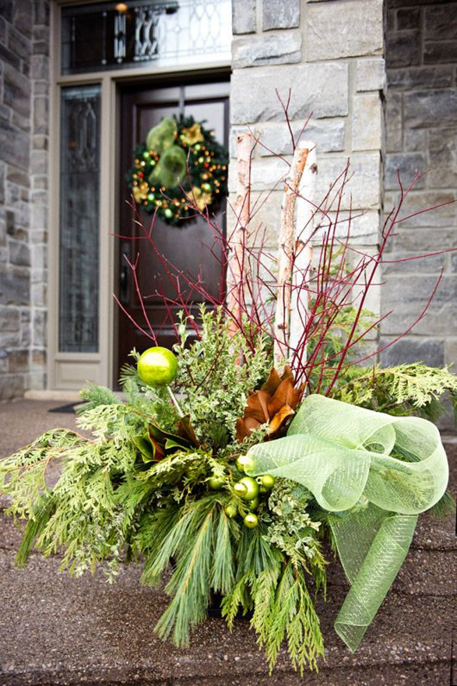 Outdoor Christmas Arrangement. Beautiful Outdoor Christmas Arrangement Ideas. #Outdoor #Christmas #Arrangement #planter Via HGTV.