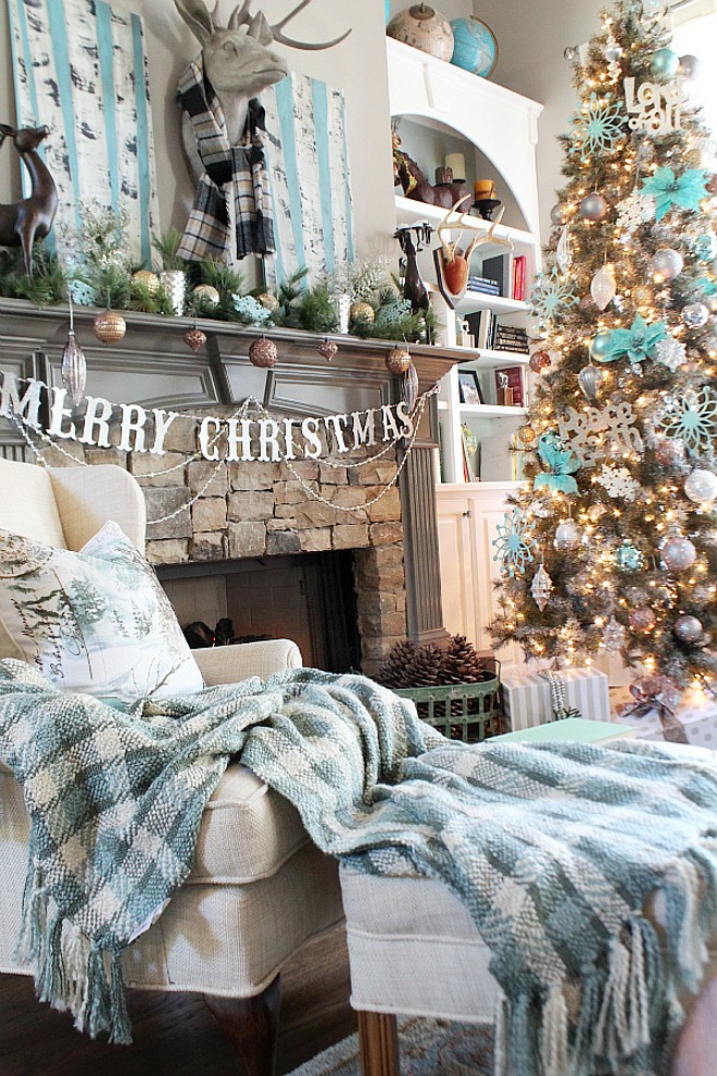 Turquoise Christmas. Living room with Turquoise Christmas Tree and Turquoise Christmas Mantel Decor #Turquoise #Christmas House of Turquoise.