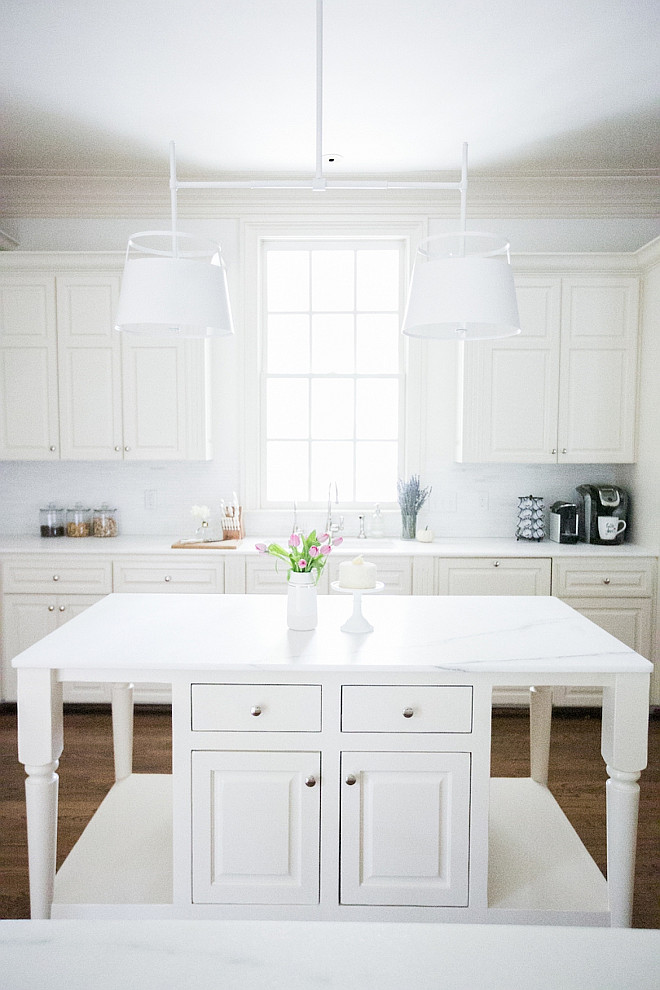 White kitchen painted in Benjamin Moore OC-17 White Dove and White Bianco Oro marble countertop. #BenjaminMooreWhiteDove Fashionable Hostess.