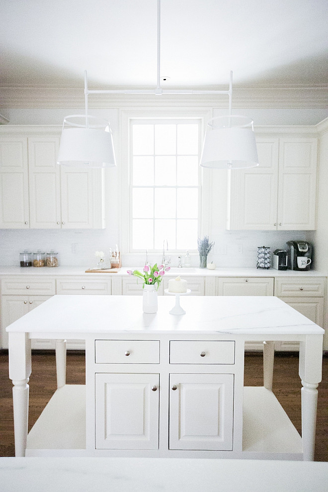 White kitchen painted in Benjamin Moore OC-17 White Dove and White Bianco Oro marble countertop. #BenjaminMooreWhiteDove Fashionable Hostess.