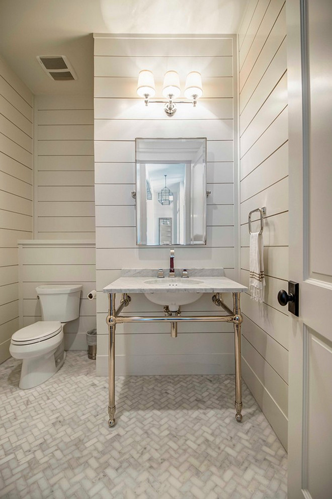 Tongue and groove bathroom. Tongue and groove wall bathroom. White Tongue and groove bathroom walls. Flooring is mini marble tile set in herringbone pattern. #Tongueandgroove #bathroom #Tongueandgroovebathroom Geschke Group Architecture.