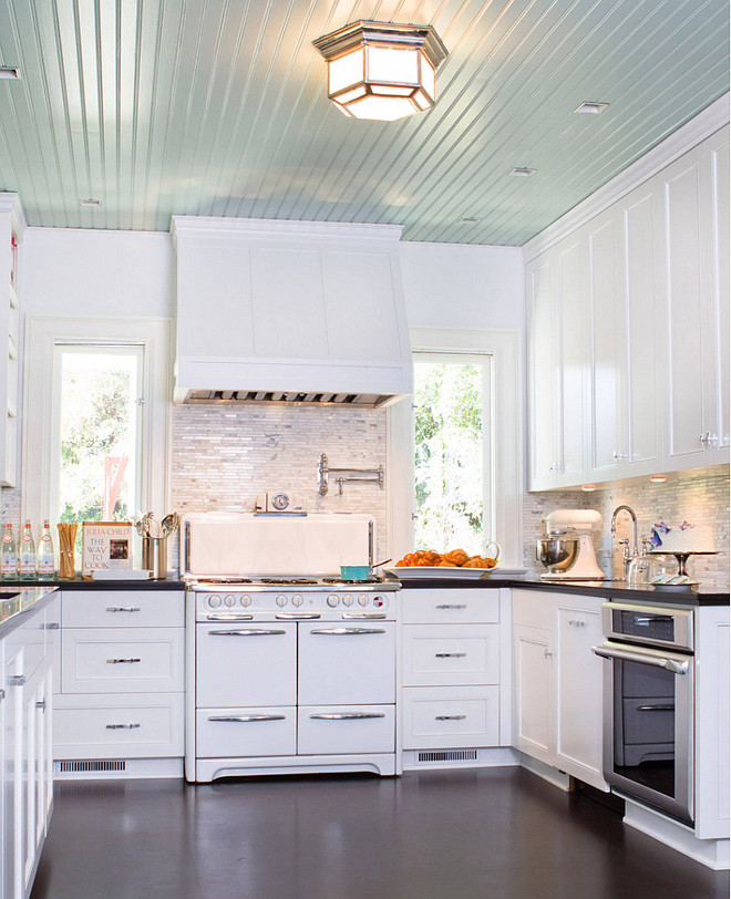 Blue Ceiling Kitchen Paint Color. Kitchen with white cabinets and blue ceiling paint color. Ceiling is Bali 702 and Walls are White Dove OC-17 by Benjamin Moore. Charmean Neithart Interiors, LLC.