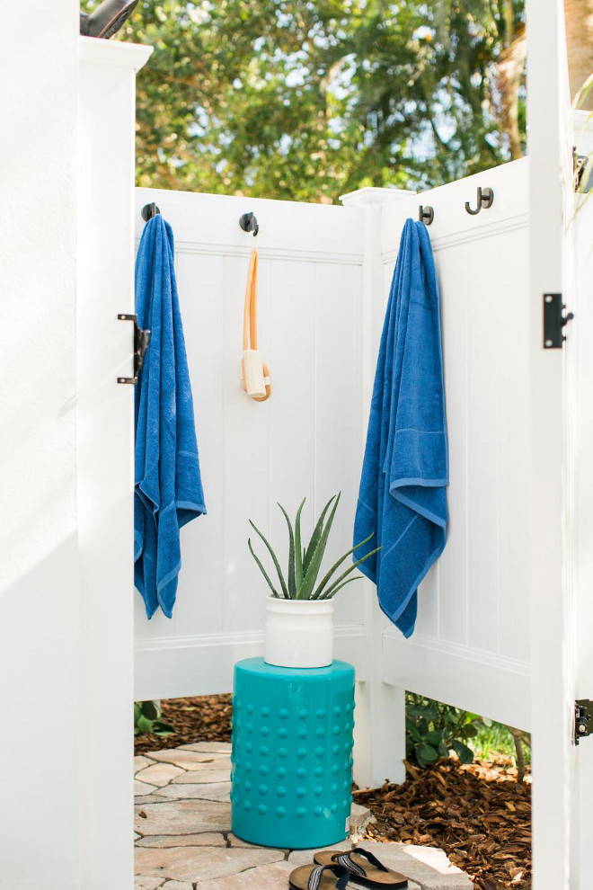 Closed Outdoor Shower. A wide door to the outdoor shower tucked into the corner of the back patio allows for privacy when in use.