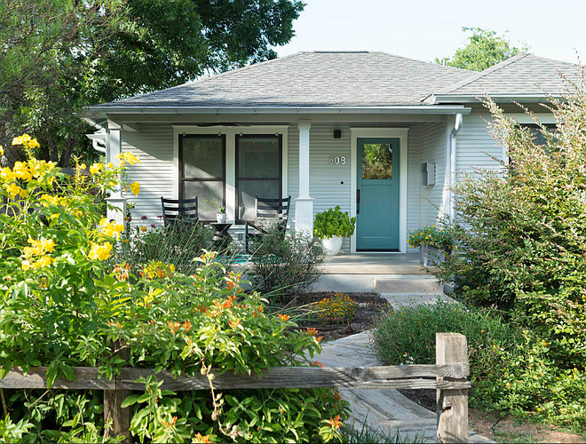 Cottage with Blue front door paint color. Cute cottage with blue front door paint color ideas. #Cottage #Bluefrontdoor #bluedoor #paintcolor Tim Cuppett Architects.