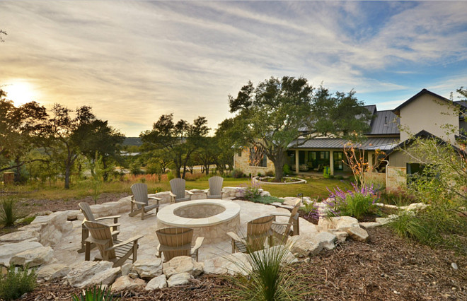 Farmhouse Firepit. Farmhouse backyard with stone firepit. Stone firepit ideas. Farmhouse firepit with stone surround. #Farmhouse #Firepit #stone #backyard Geschke Group Architecture.