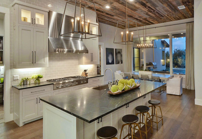Farmhouse kitchen with reclaimed wood ceiling. Kitchen Reclaimed Wood Ceiling. #FarmhouseKitchen #ReclaimedWood #Ceiling #ReclaimedWoodCeiling Geschke Group Architecture.