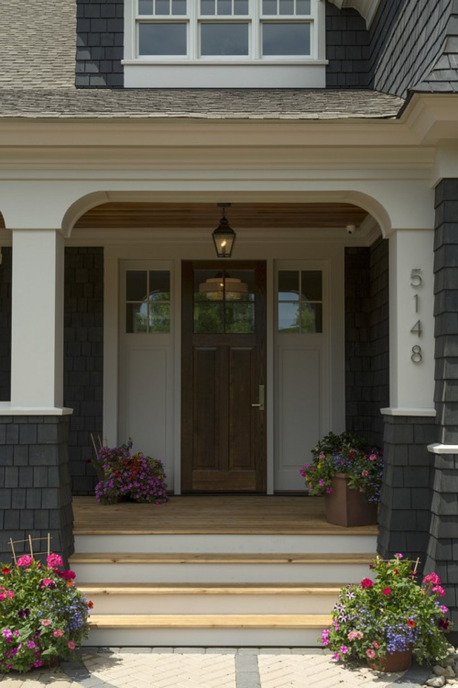 Front Door. Front Door. Wood Door. Real Wood Front Door. Real Wood front door with painted sidelights. #WoodDoor #WoodFrontDoor Spacecrafting Photography. Carl M. Hansen Companies.