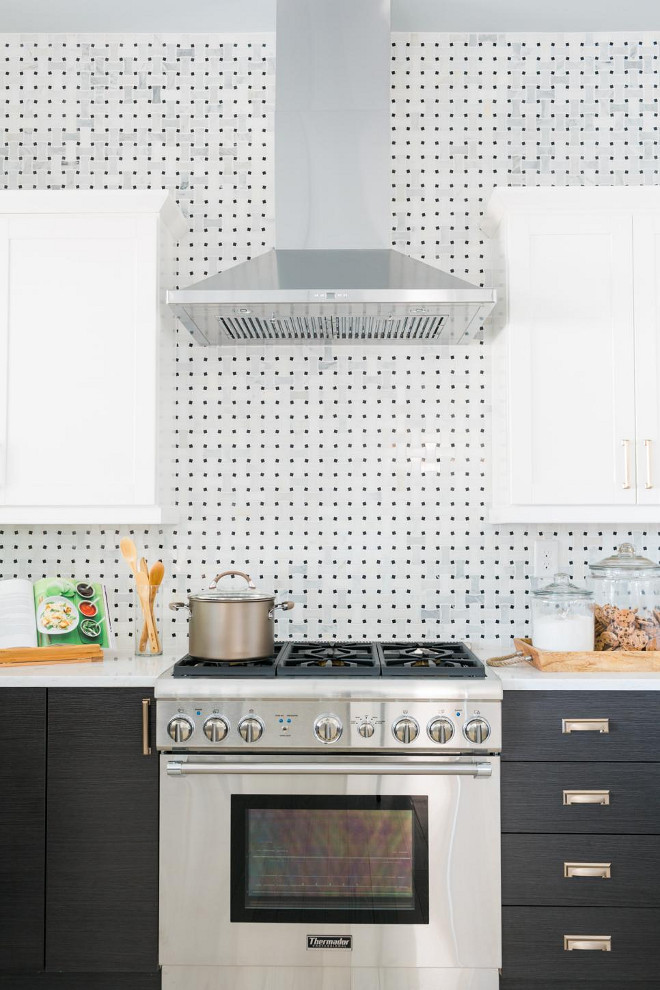 HGTV Dream Home 2016 Kitchen. The industrial looking range hood and chefs stove give the kitchen a restaurant feel