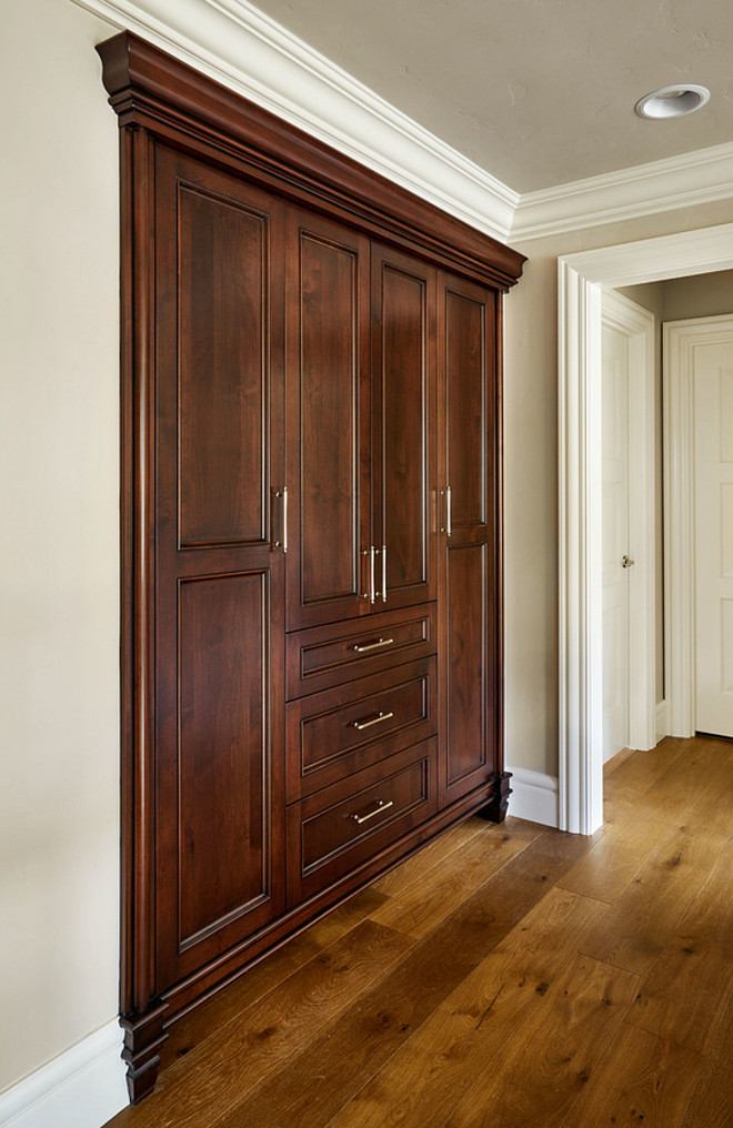 Hallway Linen Cabinet. Hallway Custom Linen Cabinet. This hallways linen cabinet was custom stained.#Hallway #LinenCabinet.