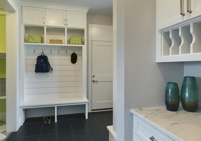 Mudroom. Mudroom off kitchen. Mudroom bench off kitchen. #mudroomoffkitchen #mudroombench This is a very popular mudroom design that can be done in any space, big or small: mudroom bench with tongue and groove walls and shelves above. Spacecrafting Photography. Carl M. Hansen Companies.