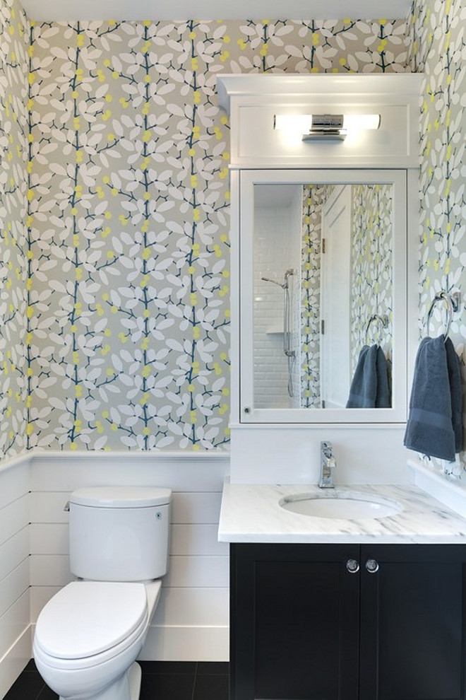 Powder room wallpaper. Fun Powder room wallpaper. Powder room wallpaper ideas. Powder room with half wall shiplap and wallpaper. The powder room features top half of walls with modern floral wallpaper and bottom half of walls with tongue and groove. #Powderroom #wallpaper