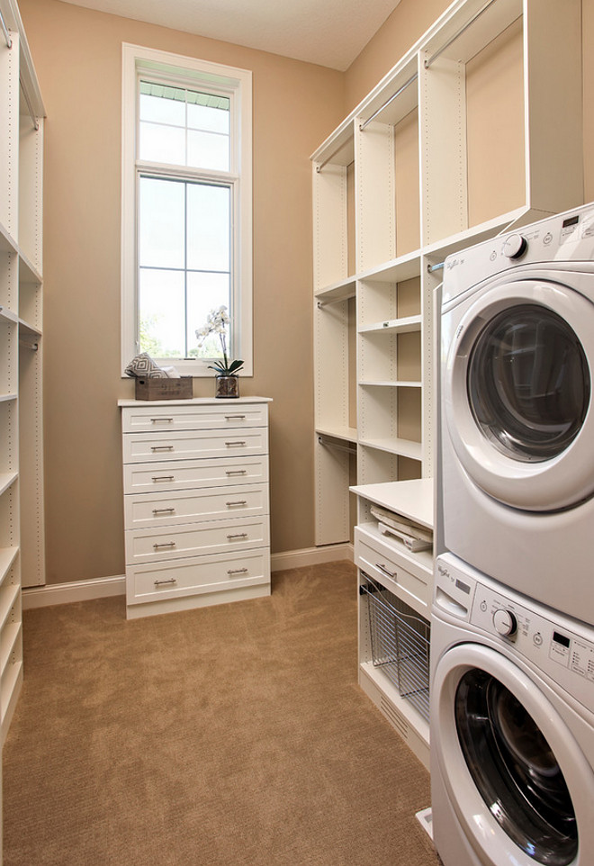Walk-in Closet with Laundry Room. Laundry room in walk-in closet. #WalkinCloset #laundryroom Pillar Homes.