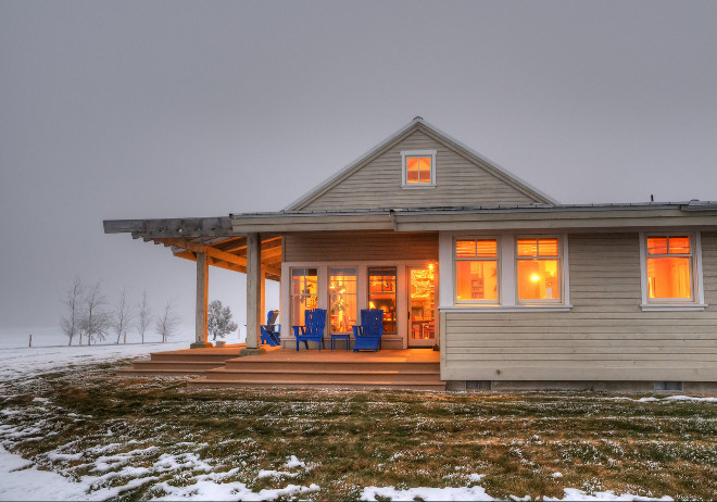 White Farmhouse exteriors. White Farmhouse with metal roof. Designs Northwest Architects.