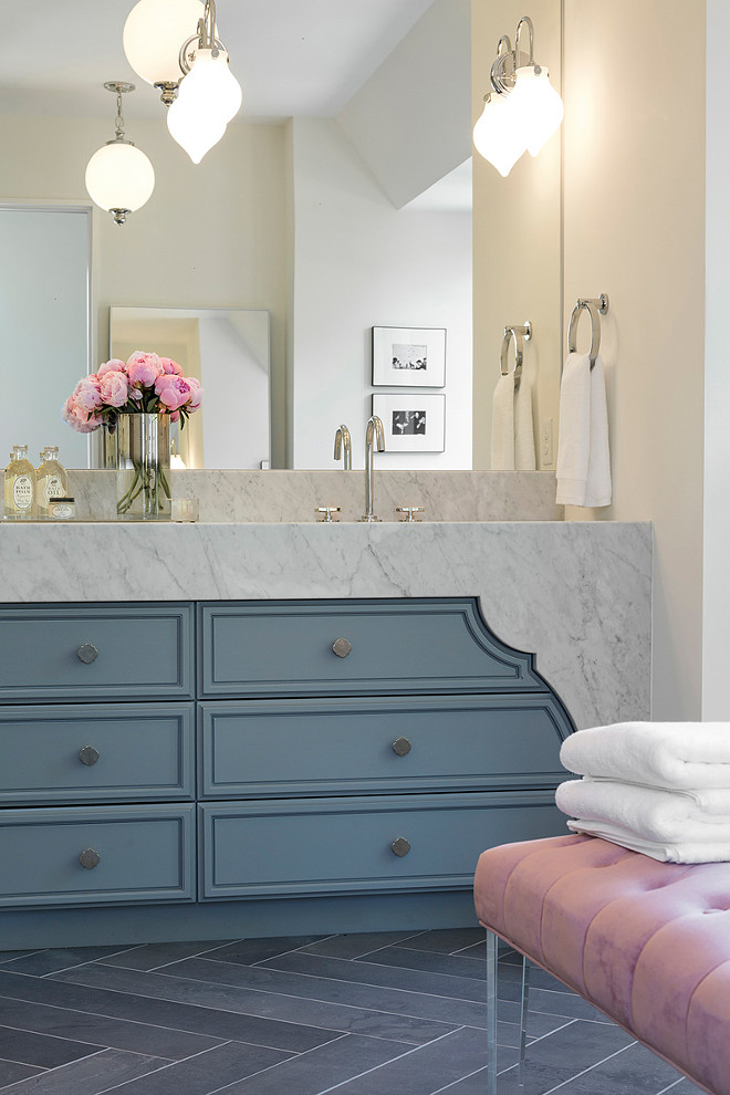 Bathroom with thick marble countertop, custom vanity and herringbone slate floor tiles. Adding marble to the side of the countertop gives a thick marble look to this bathroom countertop. #Bathroom #Thickmarble #BathroomCountertop #thickmarblecountertop #customvanity #slatetiles #herringbonetiles Spacecrafting Photography.