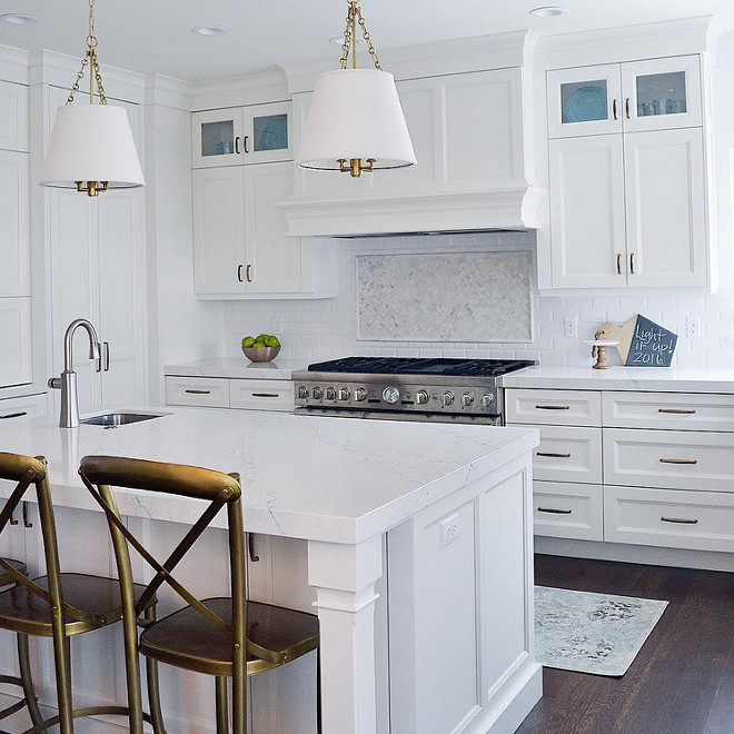 Kitchen white quartz countertop. Kitchen with thick white countertop. This kitchen features island and perimeter counters in Pental Quartz in Avenza. #PentalQuartz #AvenzaQuartz #Kitchenwhitequartz #whitequartz #thickquartzcountertop Sita Montgomery Design