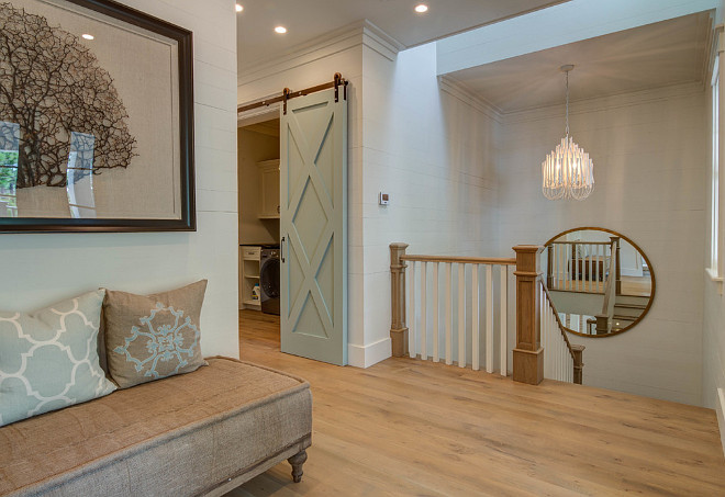 Second floor laundry room with turquoise sliding barn door. Beach house with Second floor laundry room with turquoise sliding barn door. #Secondfloorlaundryroom #turquoisebarndoor #slidingbarndoor 30A Interiors