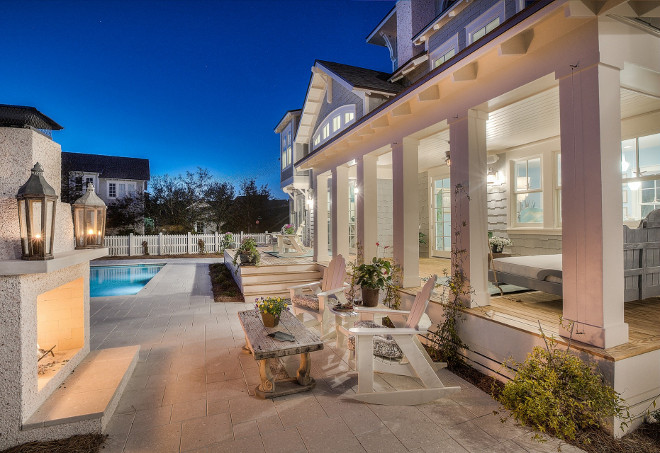 Backyard with large porch, outdoor fireplace and pool. #Backyardideas #backyard 30avibe Photography.