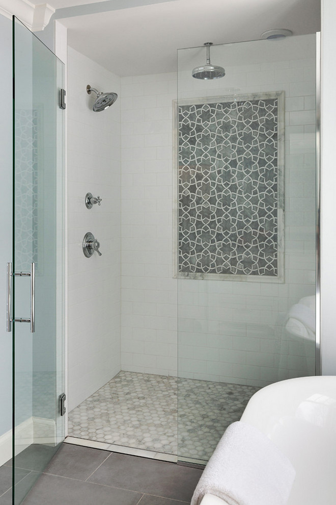 Bathroom shower tile. Bathroom shower tile combination. The shower features a classic combination of marble and white subways tiles. athroom shower tiles. Bathroom shower tile ideas. Bathroom shower tile design. #Bathroom #showertile #Bathroomshowertile Grace Hill Design