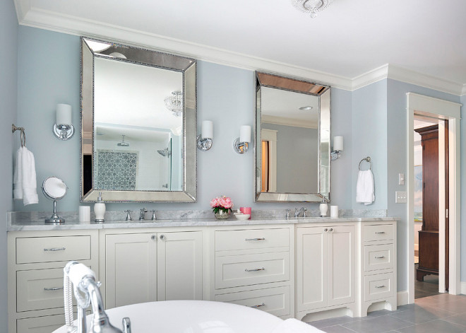 Gray bathroom walls with white cabinet paint color. This gray bathroom wall paint color is Pale Smoke by Benjamin Moore. The white cabinets paint color is White Dove by Benjamin Moore.