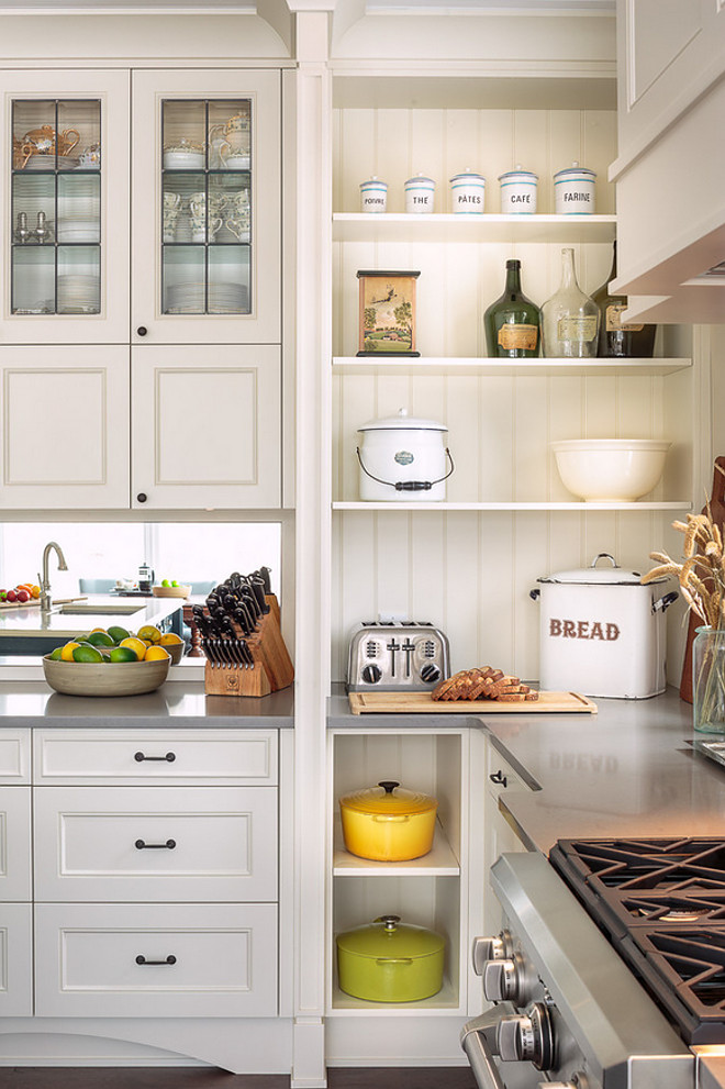 Like any good farmhouse kitchen, this one features a mix of open shelves and cabinets. To give this kitchen a farmhouse style, the designer used a wide beadboard behind the open shelves and tongue and groove on the ceiling for a more finished look Kitchen cabinet with open shelves Kitchen uses combination of cabinets and open shelves with beadboard on the back #Kitchenn #Cabinets #Kitchencabinets #openshelves #beadboard Astro Design Centre