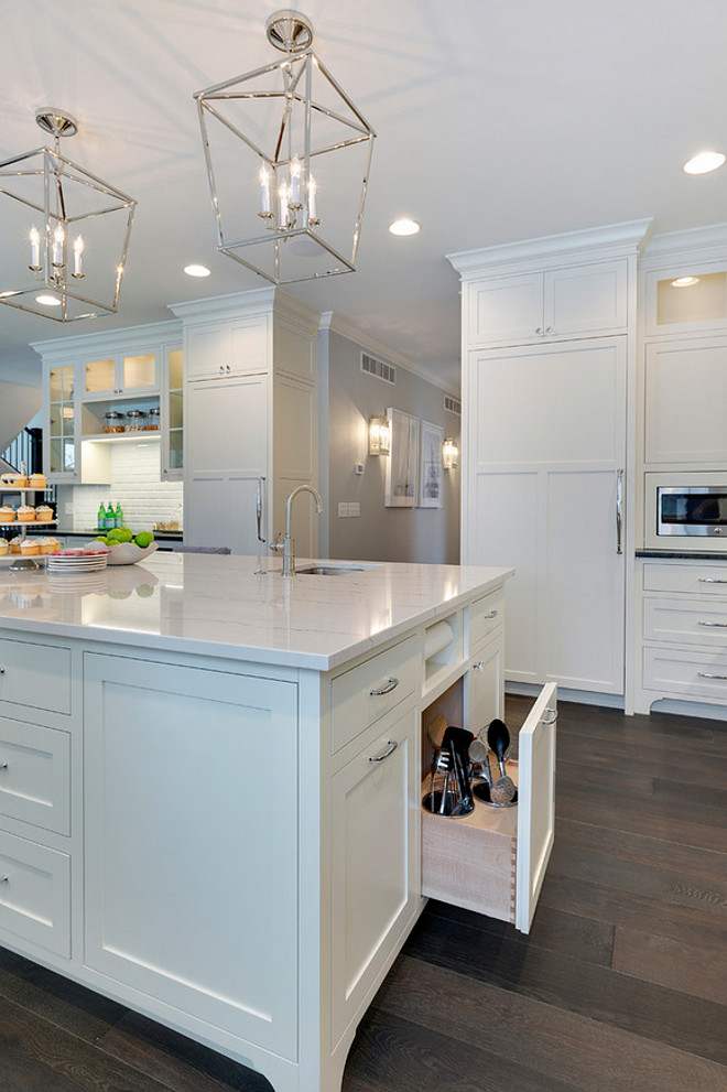 Kitchen island space saver photos and ideas. How to design an kitchen island space saver. This kitchen island has many inspiring space saver ideas! I love the paper towel holder and the cooking utensil drawer. Isn't this brilliant? #kitchenislandspacesaver Grace Hill Design