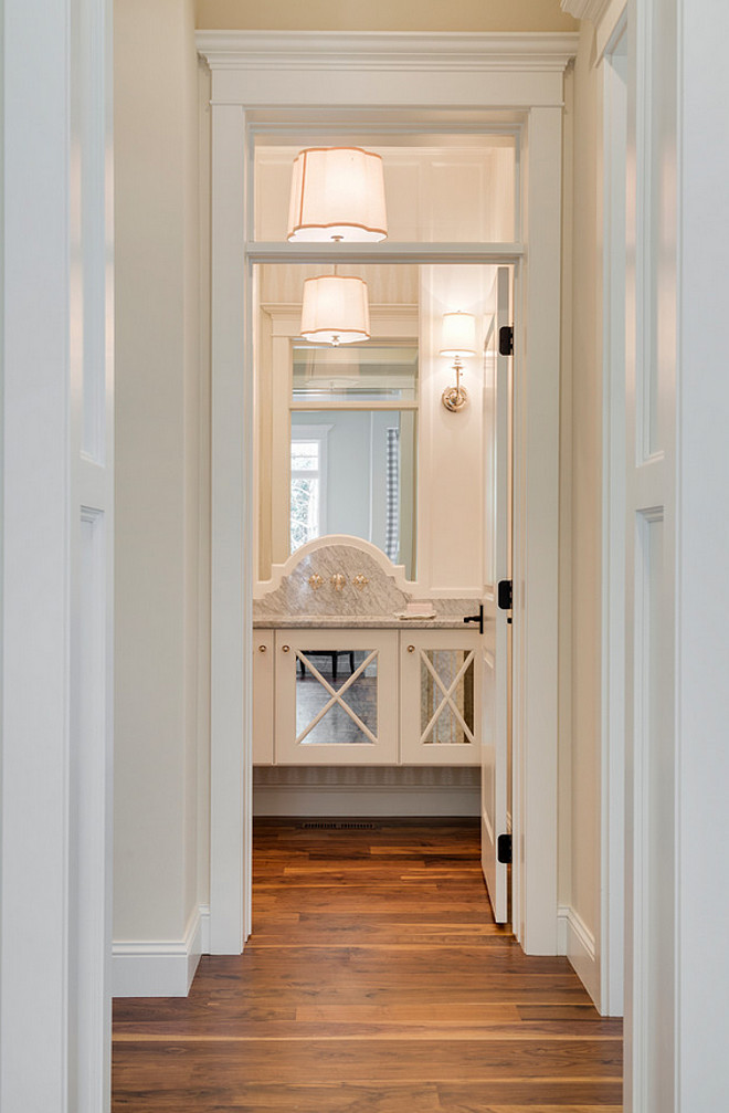 Main Floor Powder Room, A hallway connects the kitchen to powder room in the main floor, #maindfloor #powderRoom Divine Custom Homes Bria Hammel Interiors