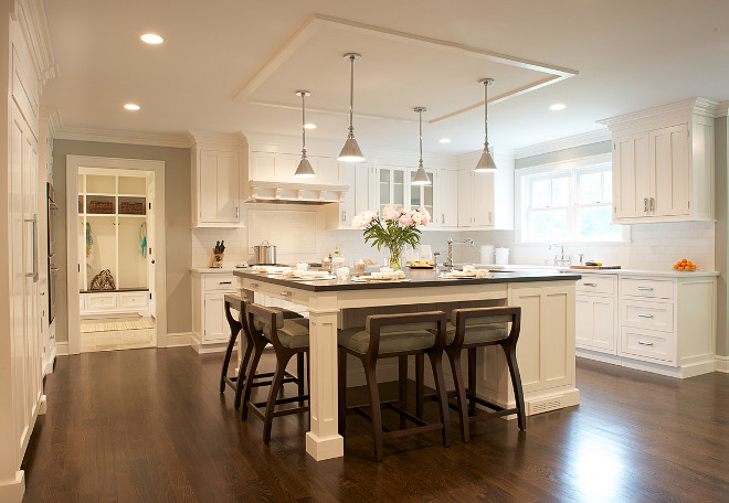 Off white kitchen cabinets with walnut hardwood floors #whitekitchen #offwhitekitchen #wanutfloors #walnutflooring #kitchenwalnutfloor Dalia Canora Design