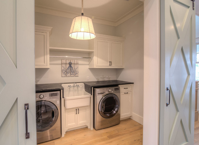 Second Floor Laundry Room with Barn Doors painted in SW 6205 Comfort Gray and sink. #Laundryroom #secondfloorlaundryroom #barndoor #SW6205ComfortGray 30A Interiors