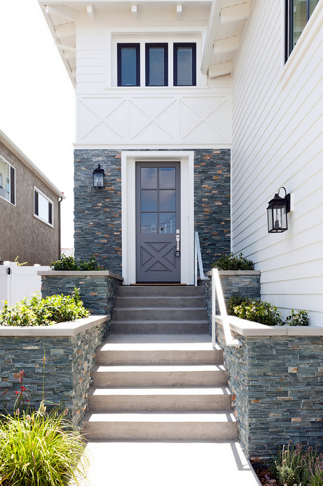 White siding and gray stone exterior. Siding and stone exterior. Siding and stone exterior ideas. Siding and stone exterior pictures. Siding and stone exterior photos and ideas. #Sidingstoneexterior #Sidingstonehomeexterior #Sidingstoneexteriorideas #Sidingexterior #Stoneexterior Kate Lester Interiors