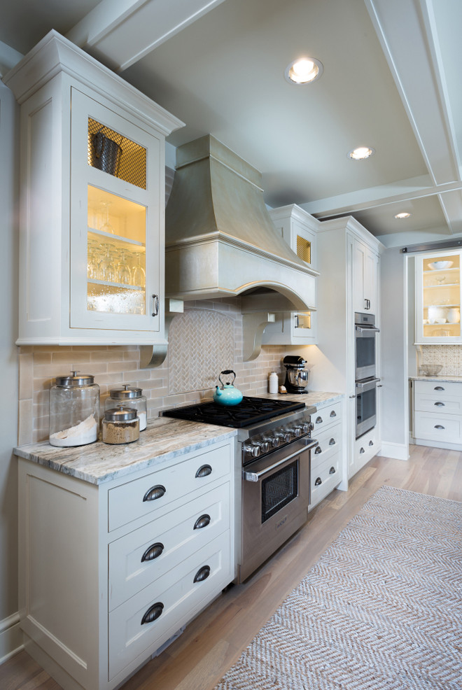 Cabinet paint color is Graham Paint 8180W Almond White. The coffered ceiling is painted in Revere Pewter by Benjamin Moore. #Cofferedceilingpaintcolor #BenjaminMoorereverepewter #WhitePaintColor #Whitecabinetpaintcolor #softwhitepaintcolor #softwhite Mike Schaap Builders.