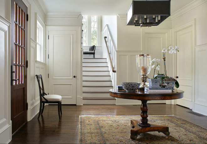 Foyer wainscoting. Foyer with sash front door, closet raised panel doors wainscoting. Foyer wainscoting. Traditional Foyer wainscoting #Foyerwainscoting #wainscoting Valerie Grant Interiors Valerie Grant Interiors.