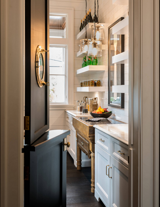 Kitchen Butlers pantry with Dutch door and porthole window. Kitchen Butlers pantry features Dutch door, porthole window, shiplap walls and white floating shelves. #kitchen #Butlerspantry #dutchdoor #porthhole #floatingshelves #shiplap Palmetto Cabinet Studio