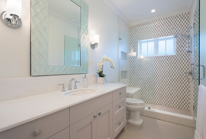 Bathroom with Shaker w/1/4 round cabinets painted in Benjamin Moore Collingwood OC-28 20 degree sheen. #BenjaminMooreCollingwoodOC28 Kemp Construction. Sarah Gallop Design Inc.