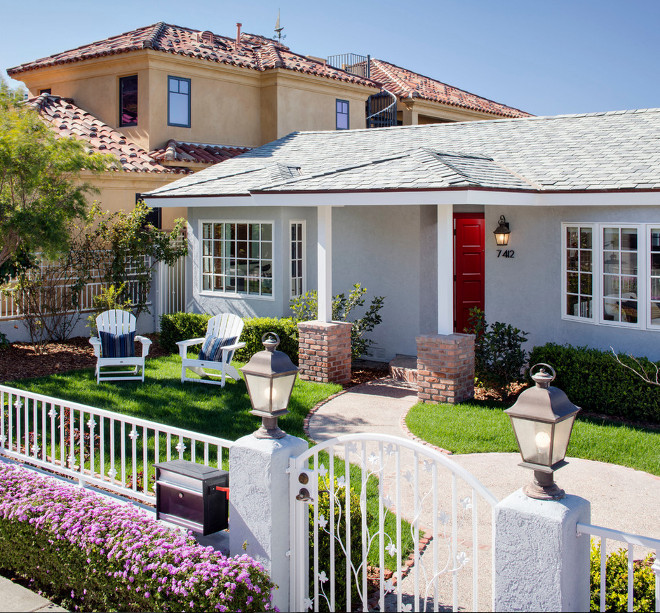 Gray Exterior Siding, Trim and Door Paint Color Combination. The outdoor color is Dunn Edwards Silver Lined DE6353, the trim is Dunn Edwards White DEW380, and the red door is Dunn Edwards DEA103 Striking Red. CM Natural Designs