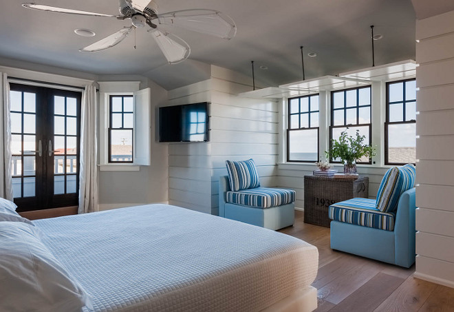 Beach house bedroom with interior shutters. interior shutters #interiorshutters Asher Architects