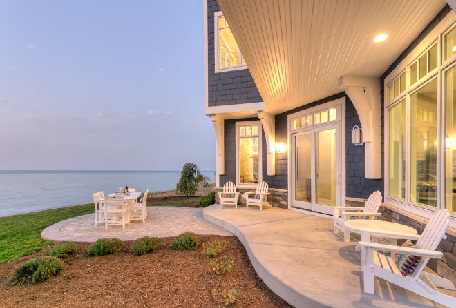 Beach house outdoor ideas. The ingenious use of outdoor space includes a backyard buffer to the beach complete with a shapely concrete paver patio and casual furnishings Mike Schaap Builders