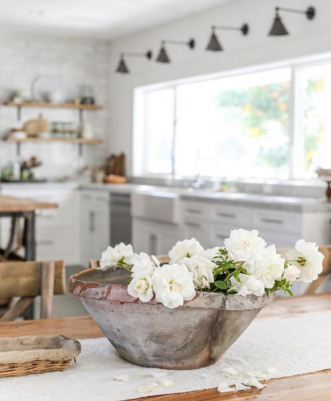 Kitchen decorating ideas. Kitchen sconces are from Restoration Hardware. Heather Bullard.