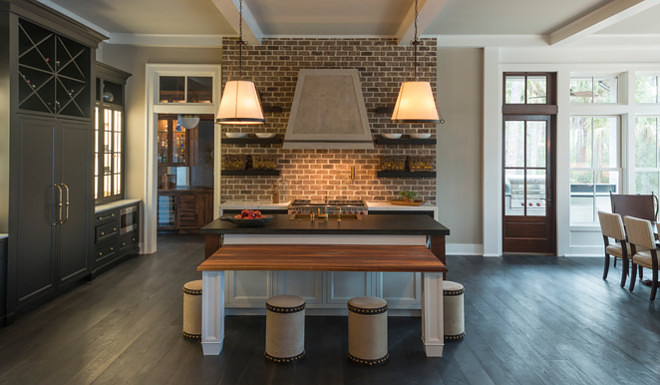 Kitchen with black cabinets and white island. Kitchen black cabinets with white island. Wall paint color is Revere Pewter HC-172 by Benjamin Moore. #Kitchen #blackcabinets #whiteisland Palmetto Cabinet Studio