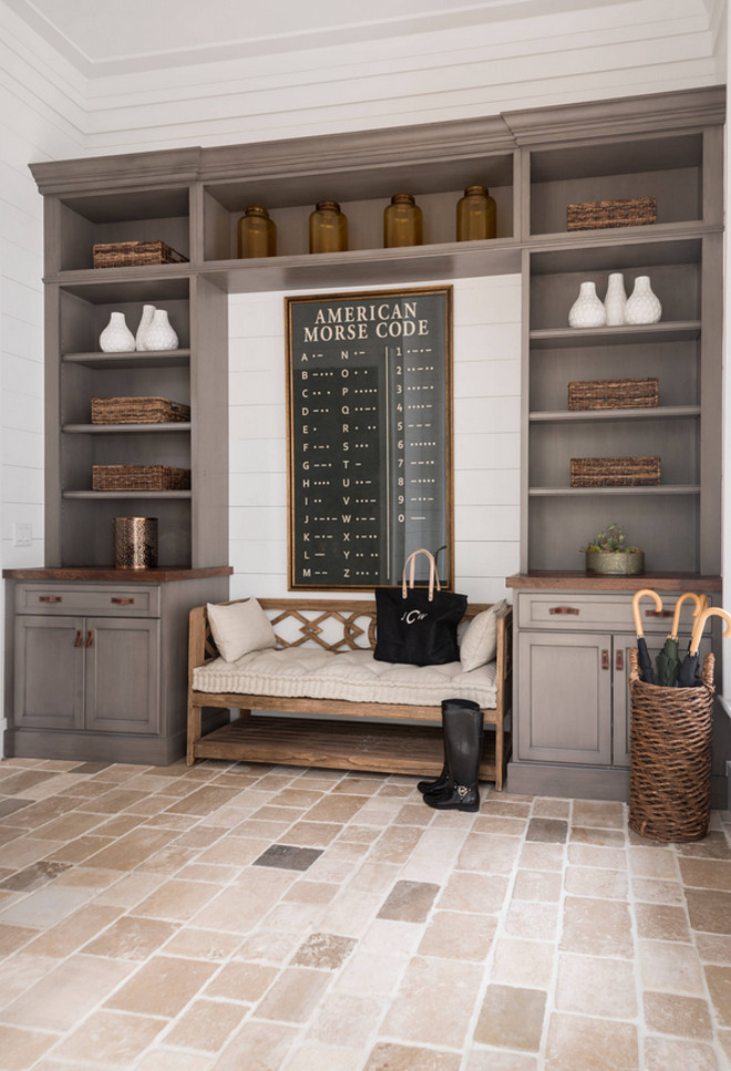 Mudroom. Mudroom features limestone floor tiles and graywashed cabinets. #mudroom #Mudroomcabinet #Mudroomfloortiles #Mudroomflooring #graywash #limestonetiles Palmetto Cabinet Studio