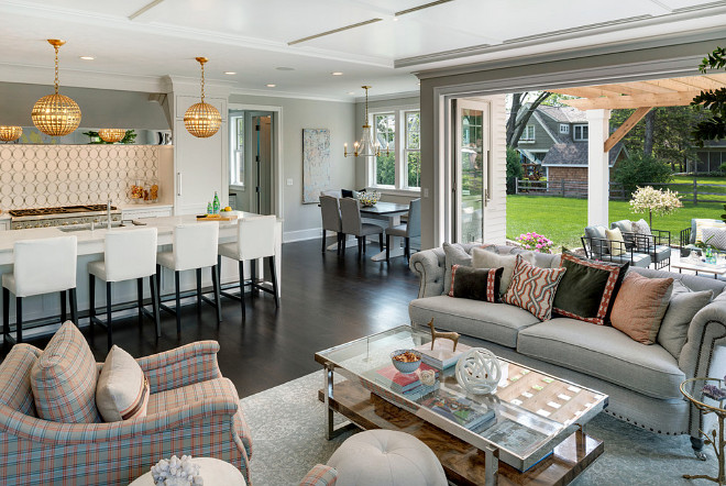 Open Kitchen Design. Kitchen opens to breakfast room and family room with folding patio doors. Open feel interiors. Spacecrafting Photography. City Homes Design and Build, LLC. Jodi Mellin Interiors.