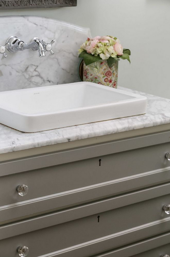 Powder Room Countertop Ideas. Powder Room features White Vermont quartzite countertop. #WhiteVermontquartzite Artisan Signature Homes.